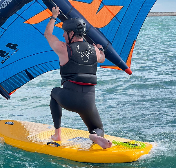 man wingfoiling in achill island